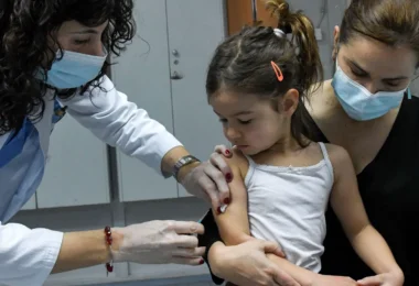 A health worker administers a measles vaccine in a hospital of Montenegro's capital Podgorica in 2020