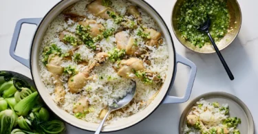 This shortcut chicken with ginger-scallion sauce is a take on Hainanese chicken rice.Credit...Nico Schinco for The New York Times. Food Stylist Barrett Washburne.
